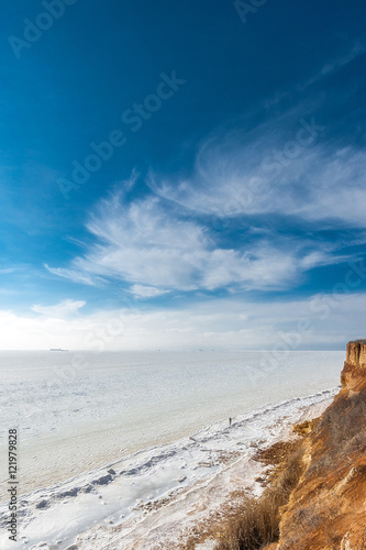 Beautiful winter seascape. Black Sea is covered with ice.