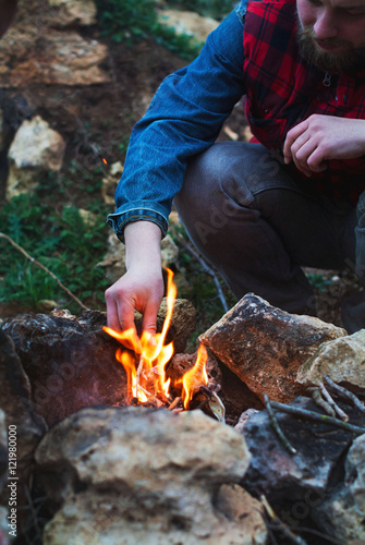 Man ignites fire in the forest