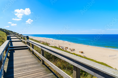 Wooden walkway on sand dune overlooking beach in Wenningstedt  Sylt island  Germany