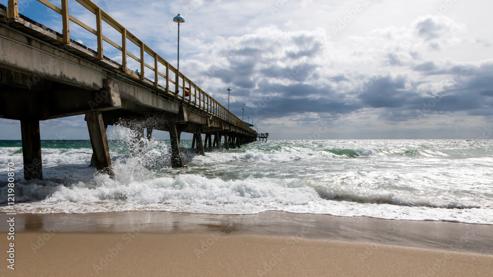 Pompano Beach Pier Broward County Florida at the Beach by windy weather Pompano Beach Pier Broward County Florida at the Beach by windy weather