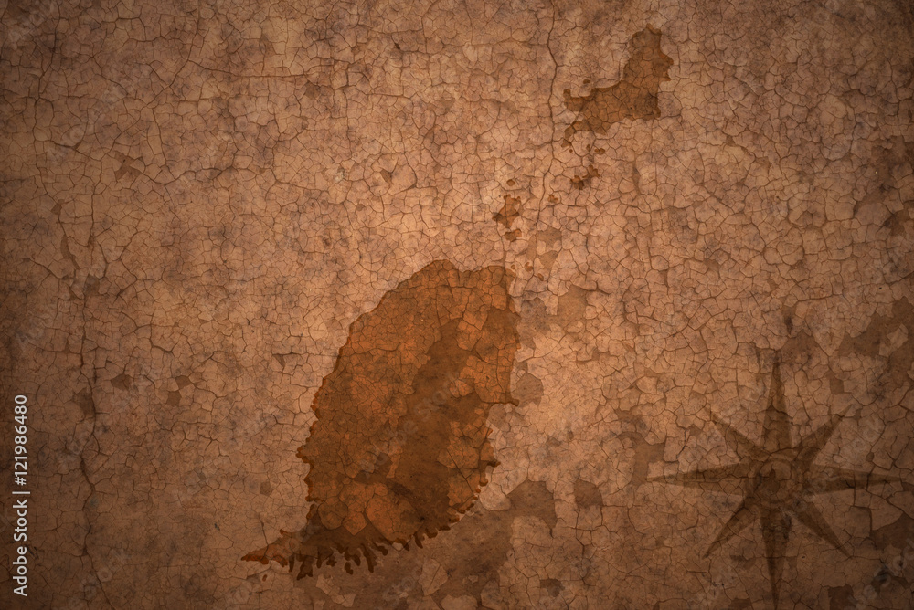 grenada map on a old vintage crack paper background