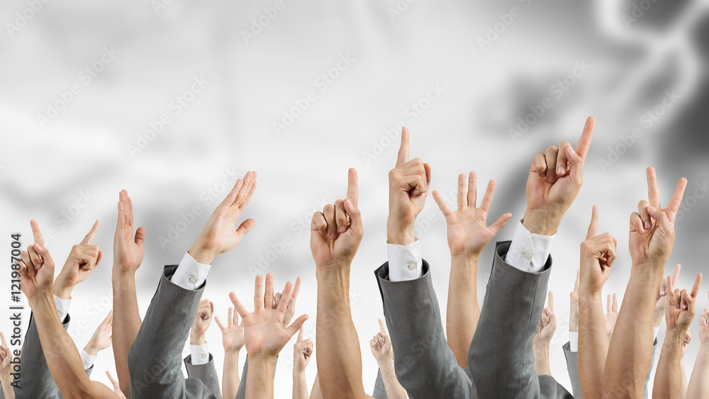 Group of people with raised hands Group of people with raised hands