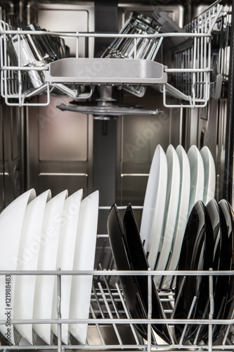 Dishes in a modern dishwasher machine