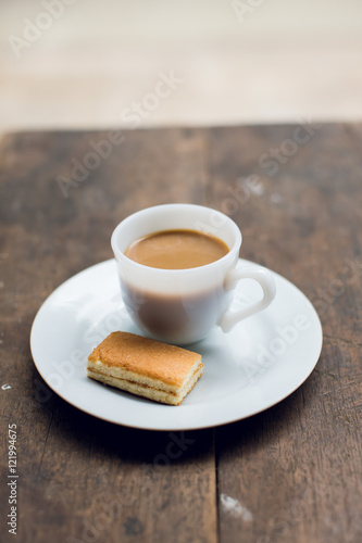 Cup of coffee with dessert Brown put on the table