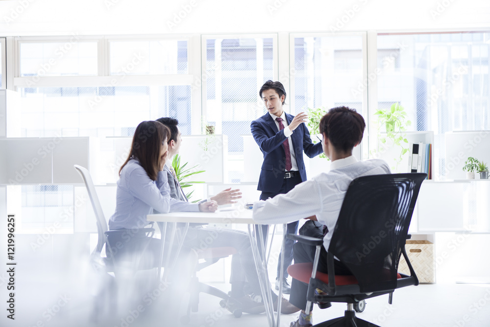 Young business people are meeting happily Young business people are meeting happily