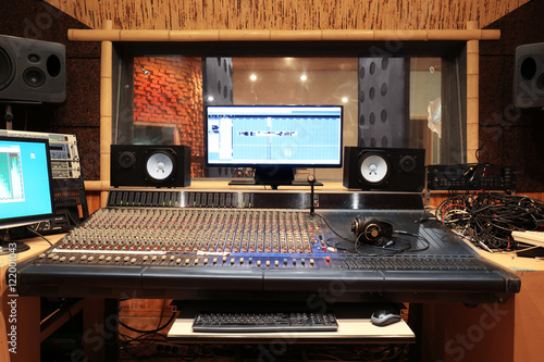 Fototapeta Sound engineer workplace in recording studio