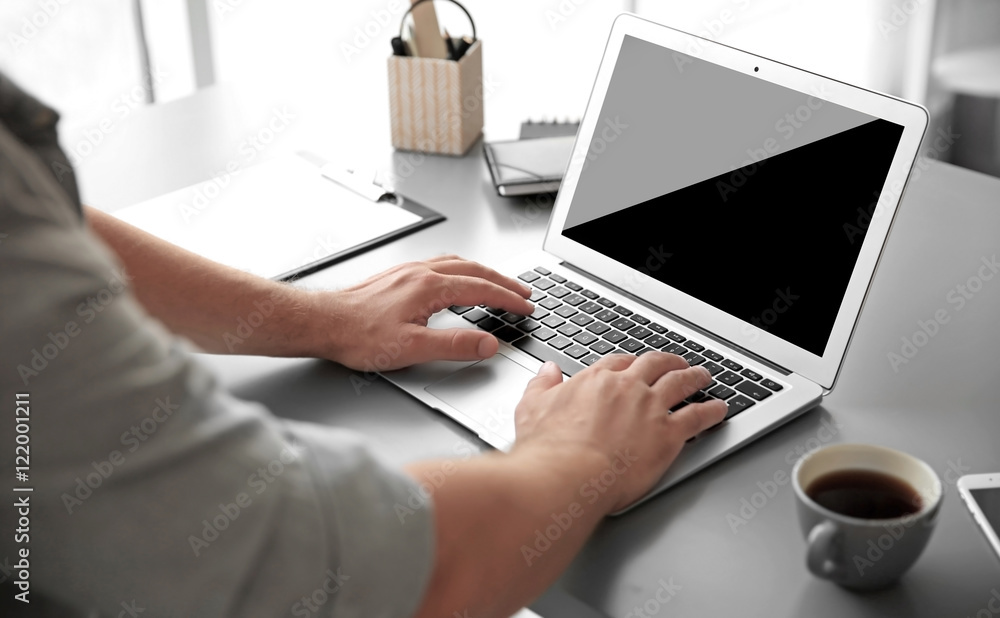 Man working on laptop, close up Man working on laptop, close up