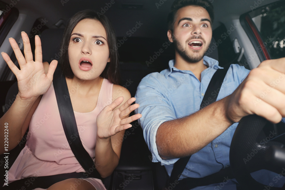Fotografie Beautiful young couple in car