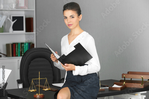 Beautiful young woman worki...