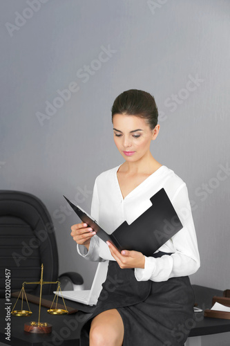 Beautiful young woman worki...