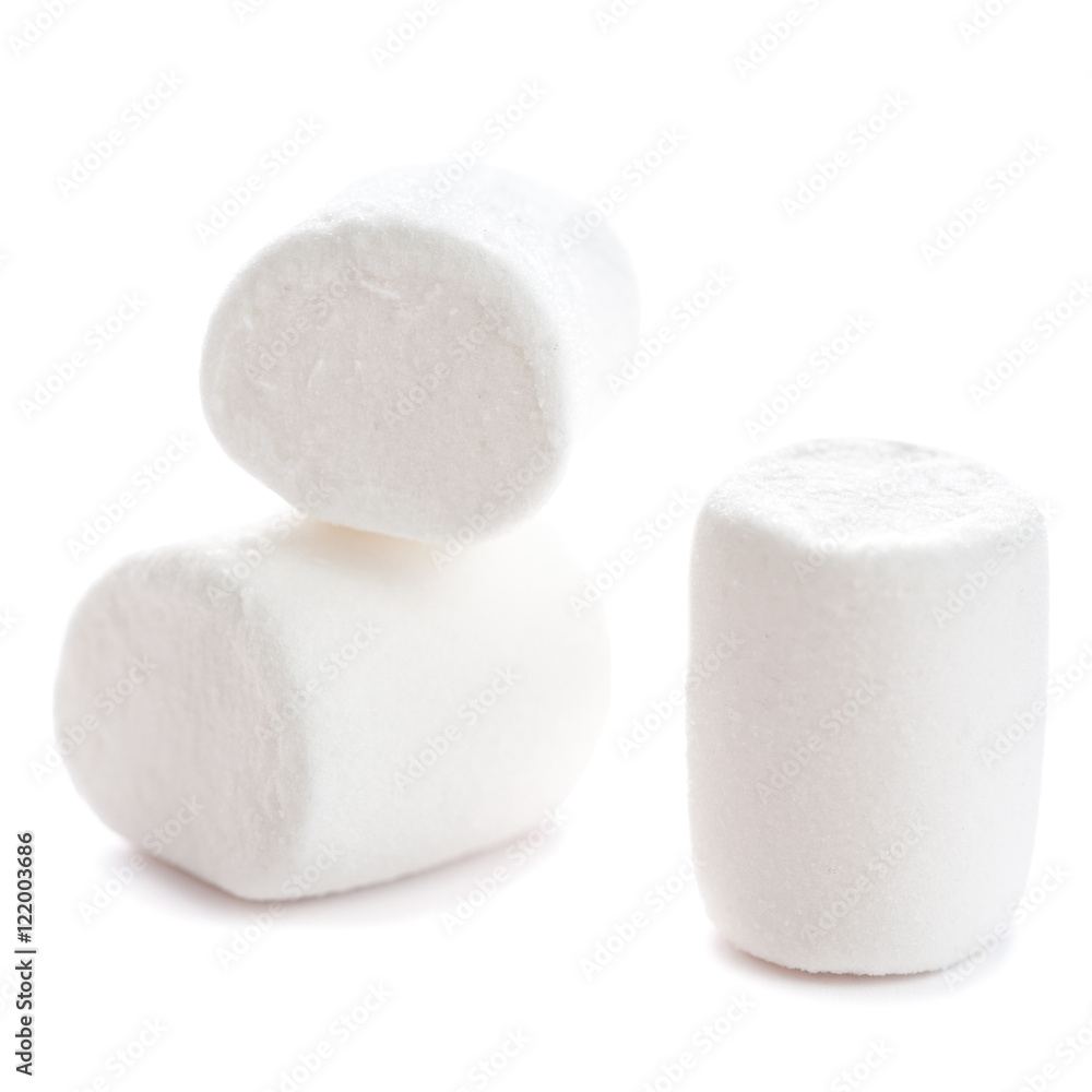Fluffy white marshmallow macro isolated over white background. H Fluffy white marshmallow macro isolated over white background. H