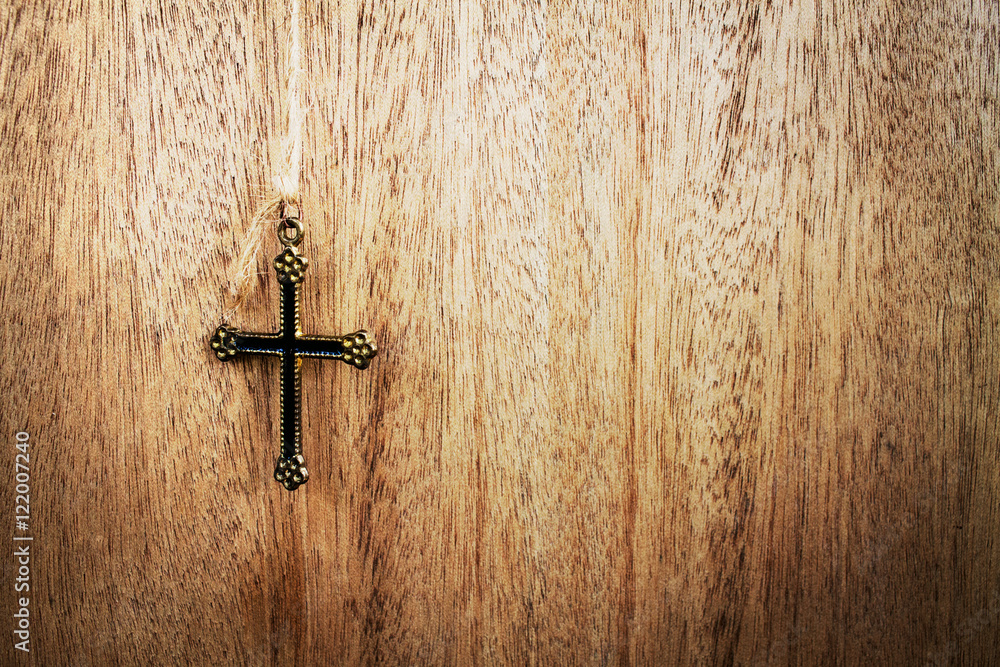 cross on wooden background cross on wooden background