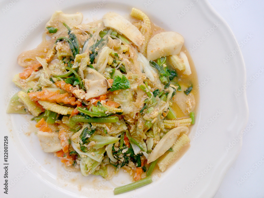 Suki without broths, stir fried mixed vegetable and tofu in sukiyaki sauce on plate. Vegetarian Food, healthy food