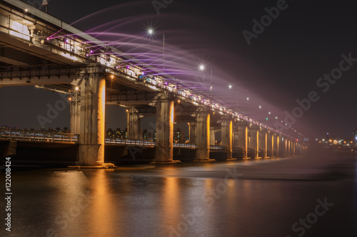 Banpo rainbow bridge fountain show taken during sunset hours, Banpo bridge fountain show is situated on the Han River, a major tourist attraction in Seoul, South Korea.