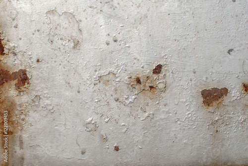 chipped paint on iron surface, grunge metal surface, great background or texture for your project © uvisni