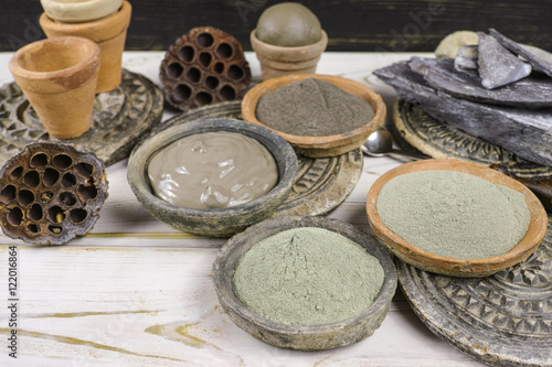 Ancient minerals - black, green, blue clay powder and mud mask for spa