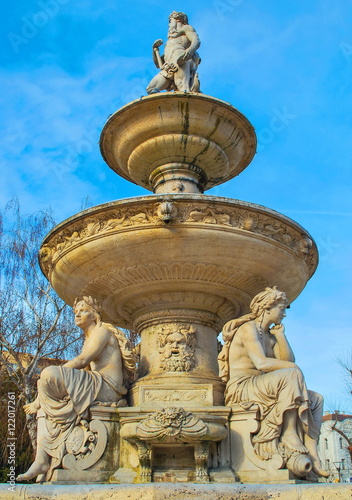 The old fountain with sculptures in the park of Budapest