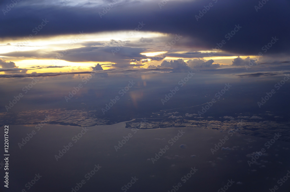 sunset rich in dark space clouds,over the ocean