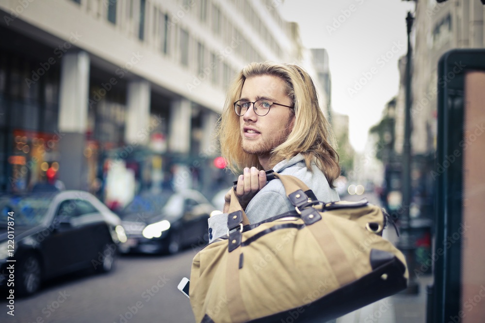 Handsome blonde man in the street Handsome blonde man in the street