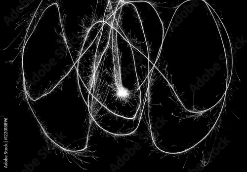 blue sparks of fire on a black background