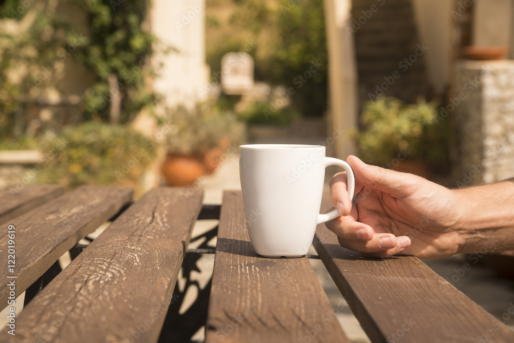 Cup of coffee in morning garden Cup of coffee in morning garden