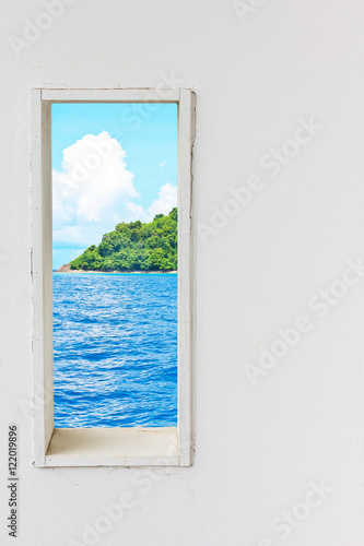 White wood wall window with sea beach view.