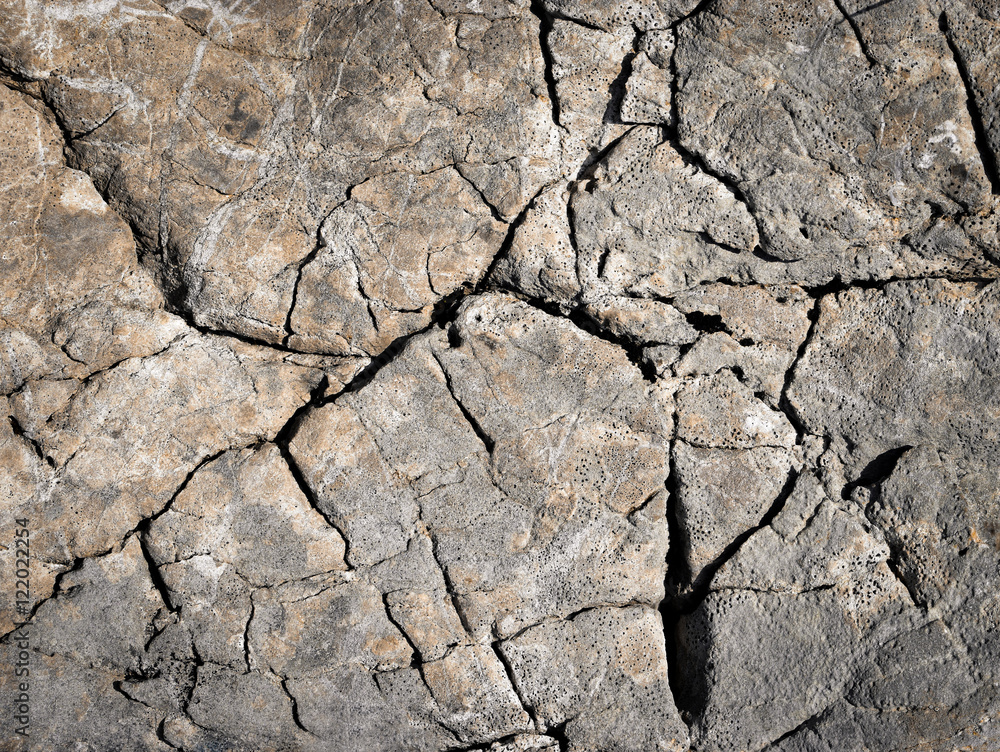 Naklejka premium old rugged grooves of surface limestone rocks
