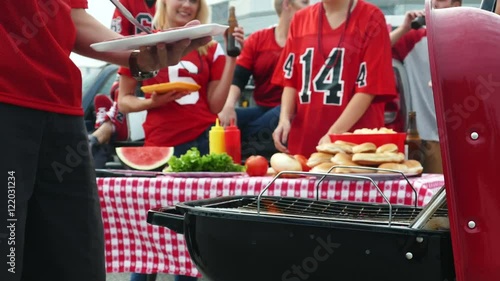 Extensive video series with football fans at a tailgate party, having fun.  Set in a parking lot outside an arena...Shot in 4k on Lumix FZ1000.
