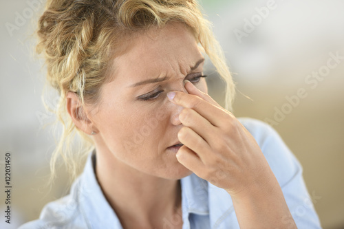 Woman suffering sinusitis photo