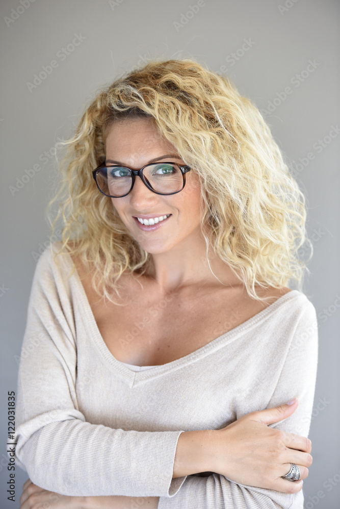 Portrait of attractive blond woman with eyeglasses, isolated