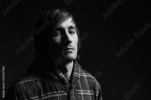 a handsome young man. black and white photography