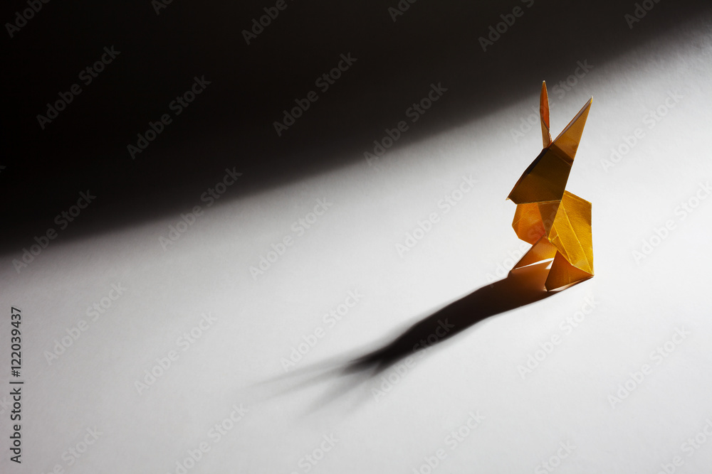 Origami rabbit isolated on neutral background Origami rabbit isolated on neutral background