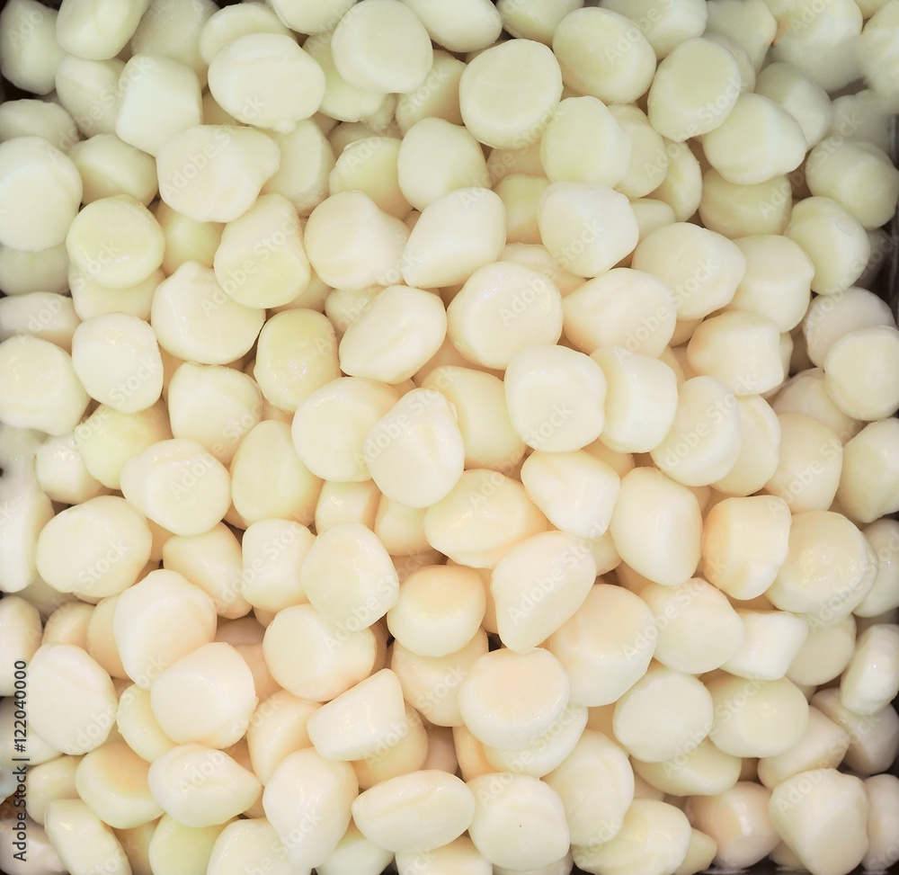 Pile of fozen scallop on fish market, view from top, fits as background Pile of fozen scallop on fish market, view from top, fits as background