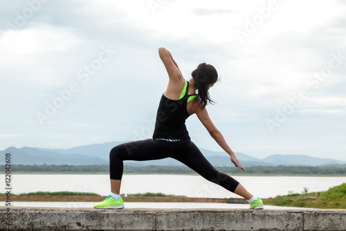 lady exercise and stretching in natural view