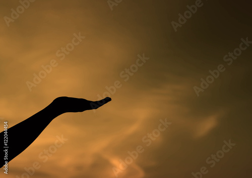 silhouette of woman hands with sunset light