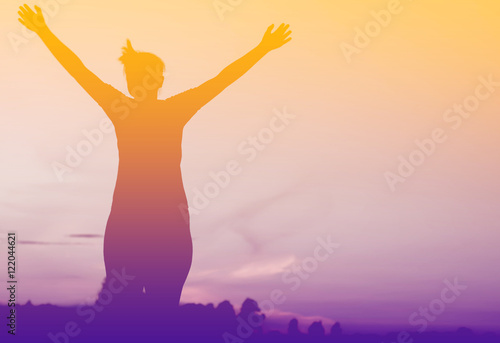 silhouette of woman Fitness to stand up in the sky.