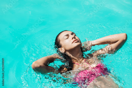 pretty sexy woman in swimming pool © Volodymyr