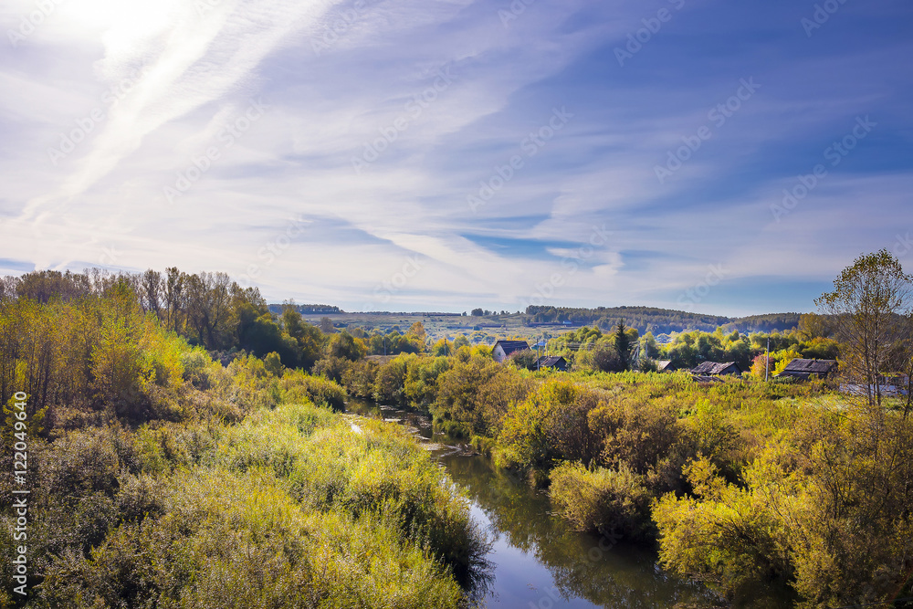 Naklejka premium Rural autumn landscape with river