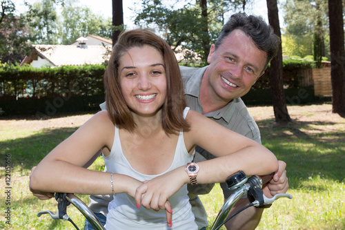 Lovely couple on cycle ride in countryside