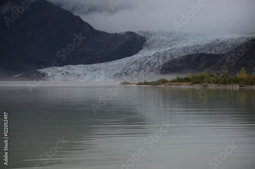 Alaska's Mendenhall Glacier reflected on lake during mist photo