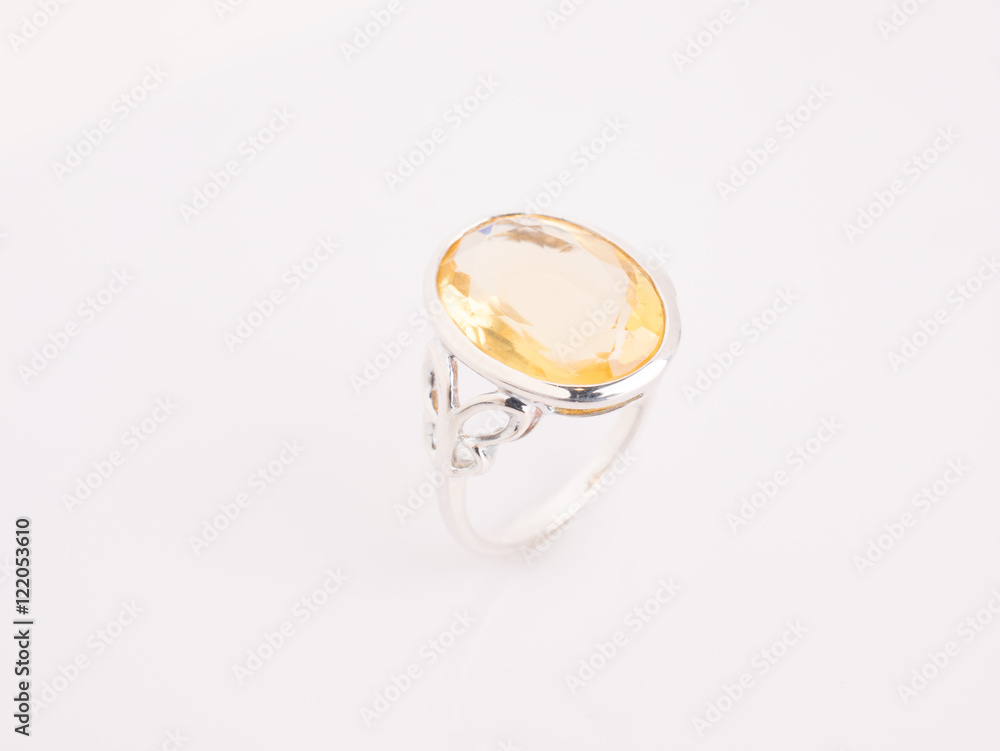 Jewel gemstone ring on white shine table Jewel gemstone ring on white shine table