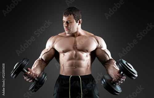 Portrait of bodybuilder with dumbbells