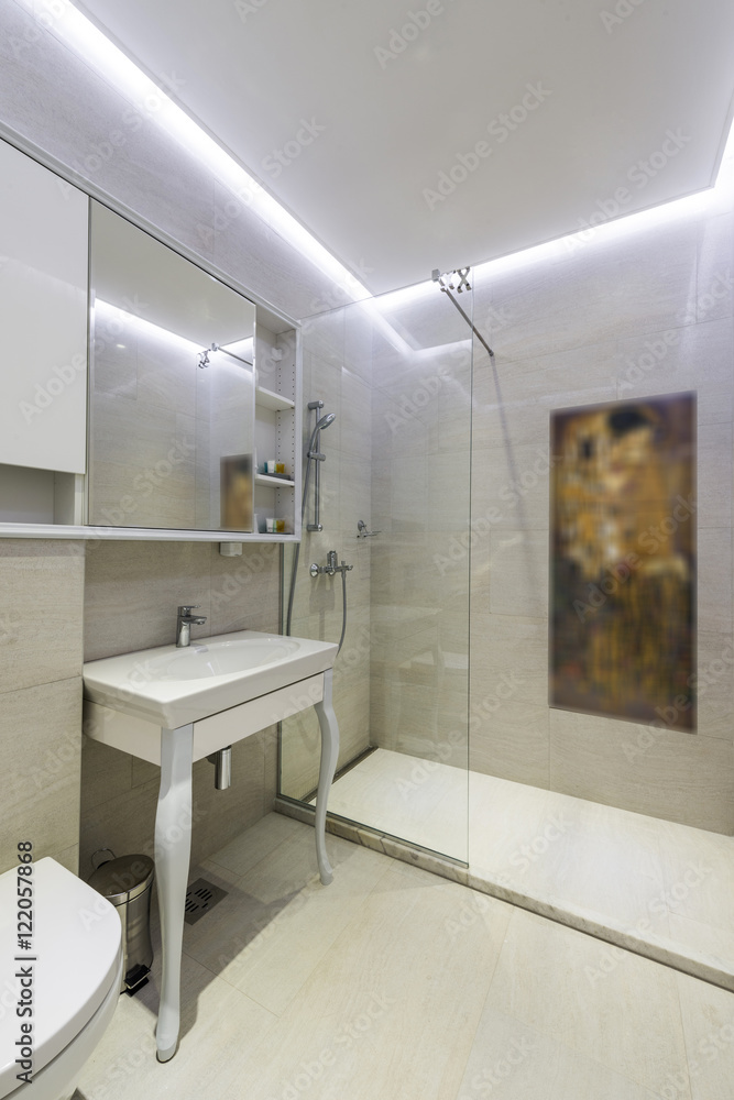 Modern en-suite bathroom with shower cabin Modern en-suite bathroom with shower cabin