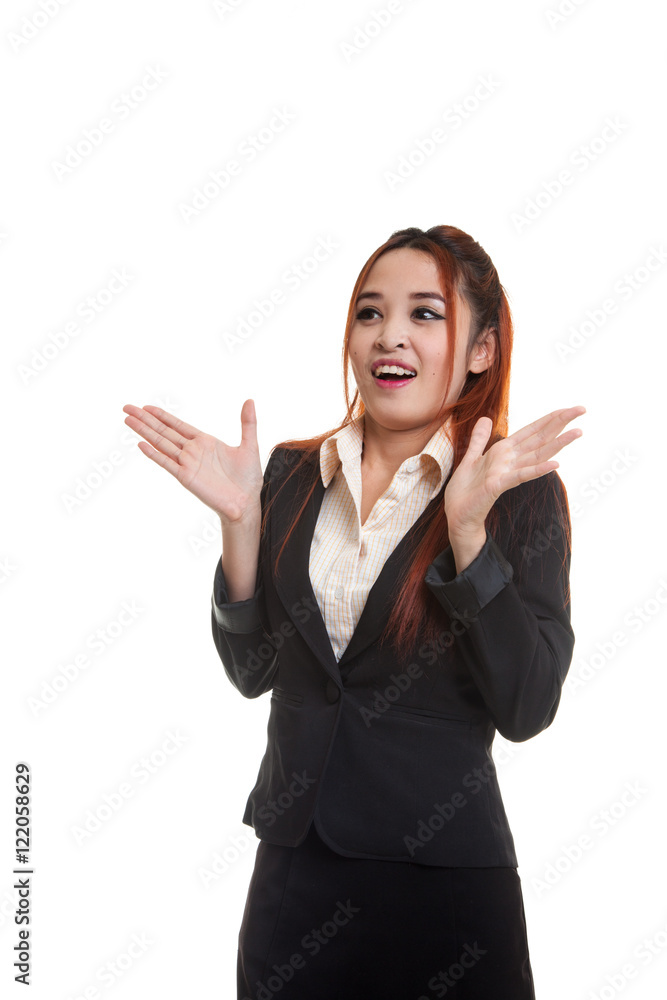 Young Asian business woman is surprised and smile. Young Asian business woman is surprised and smile.