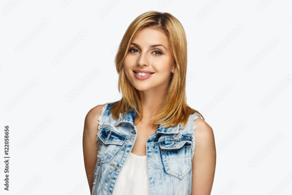 A woman in jean jacket isolated on white background. A woman in jean jacket isolated on white background.