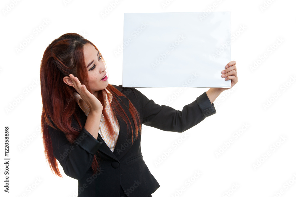 Young Asian business woman surprise with white blank sign. Young Asian business woman surprise with white blank sign.