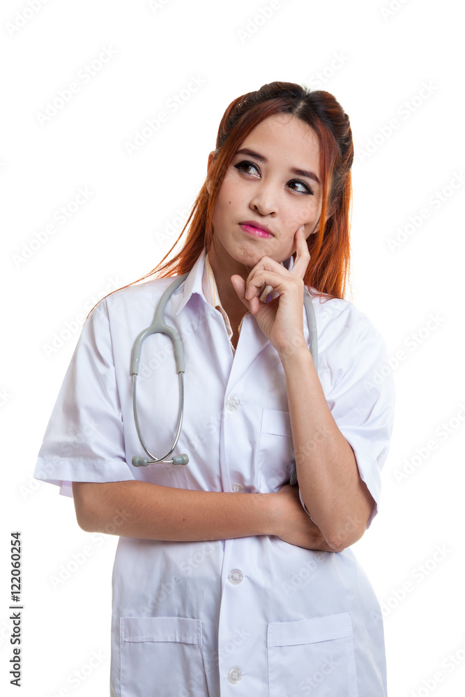 Portrait of Asian young female doctor thinking. Portrait of Asian young female doctor thinking.