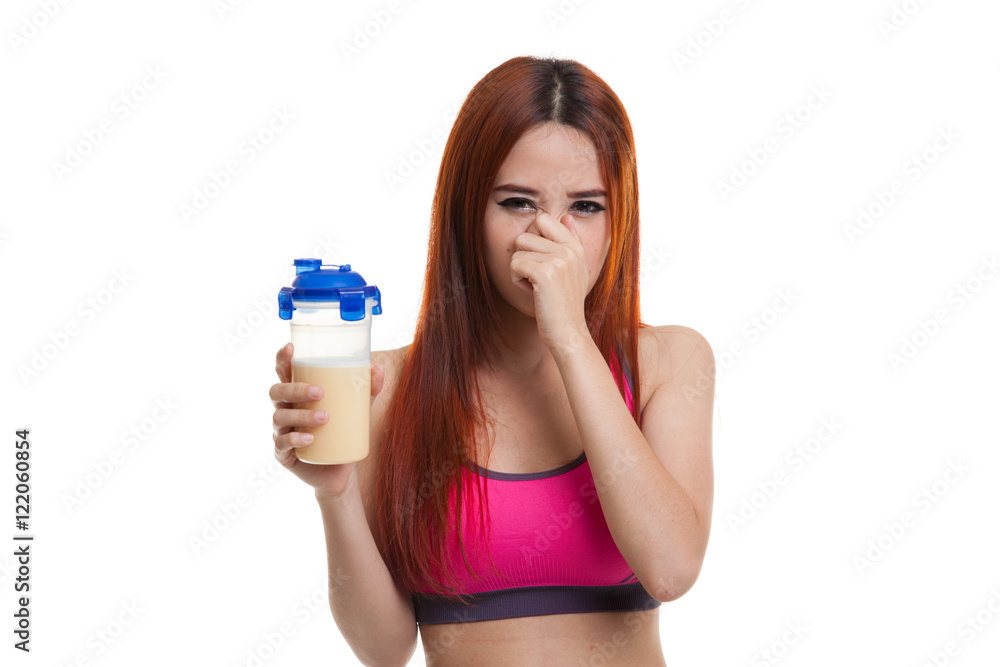 Beautiful Asian healthy girl hate whey protein smell. Beautiful Asian healthy girl hate whey protein smell.