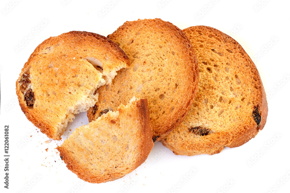 Portion of sweet dry hard bread chucks crackers with raisins Portion of sweet dry hard bread chucks crackers with raisins