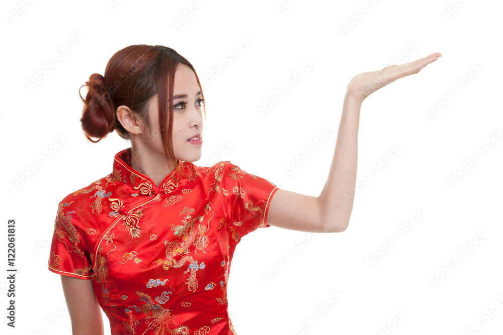 Asian girl in chinese cheongsam dress with blank space on her h Asian girl in chinese cheongsam dress with blank space on her h